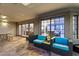 Covered patio with comfortable seating, offering views into the home at 24218 N 85Th St, Scottsdale, AZ 85255