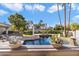Stunning pool area with lounge chairs and cactus plants at 24218 N 85Th St, Scottsdale, AZ 85255