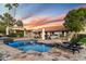 Luxury pool area with lounge chairs and a sunset view at 24218 N 85Th St, Scottsdale, AZ 85255