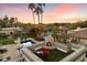 Relaxing rooftop terrace with fireplace and city views at 24218 N 85Th St, Scottsdale, AZ 85255