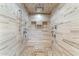 Large walk-in shower with multiple shower heads and pebble floor at 24218 N 85Th St, Scottsdale, AZ 85255