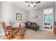 Relaxing sitting area with comfortable seating and a view of another bedroom at 33115 N 25Th Dr, Phoenix, AZ 85085