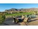 Spacious backyard with a fire pit, pool, and stunning mountain views at 4060 S Camino De Vida --, Gold Canyon, AZ 85118