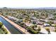 Aerial view showcasing the property and surrounding area near a canal at 4620 E Montecito Ave, Phoenix, AZ 85018