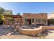 Backyard patio with pergola and access to the home at 4620 E Montecito Ave, Phoenix, AZ 85018