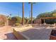 Relaxing backyard oasis with pergola, shed, and seating at 4620 E Montecito Ave, Phoenix, AZ 85018