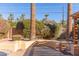 Landscaped backyard with seating area and mature plants at 4620 E Montecito Ave, Phoenix, AZ 85018
