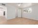 Bedroom with hardwood floors, ceiling fan, and access to closet at 4620 E Montecito Ave, Phoenix, AZ 85018