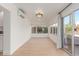 Sun-drenched dining area with sliding glass doors leading to the patio at 4620 E Montecito Ave, Phoenix, AZ 85018