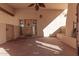 Covered entryway with a rustic wooden door and brick flooring at 4620 E Montecito Ave, Phoenix, AZ 85018