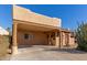 Front view of a home with a covered carport and rustic wood accents at 4620 E Montecito Ave, Phoenix, AZ 85018