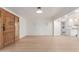 Bright living room with hardwood floors and view of kitchen at 4620 E Montecito Ave, Phoenix, AZ 85018