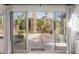 Glass sliding doors open to a spacious patio with mountain views at 4620 E Montecito Ave, Phoenix, AZ 85018