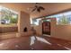 Brick patio with a built-in fireplace and seating area, creating an outdoor oasis at 4620 E Montecito Ave, Phoenix, AZ 85018