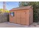 Well-maintained storage shed in the backyard at 4620 E Montecito Ave, Phoenix, AZ 85018