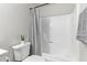 Clean bathroom with shower/tub combo and gray accents at 540 N May St # 1102, Mesa, AZ 85201