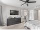 Spacious bedroom with dresser, bed, and access to other rooms at 540 N May St # 1102, Mesa, AZ 85201