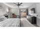 Bedroom with sliding door to backyard and built-in dresser at 540 N May St # 1102, Mesa, AZ 85201
