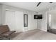 Bright bedroom with double closets and neutral walls at 540 N May St # 1102, Mesa, AZ 85201