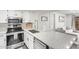 Updated kitchen featuring stainless steel appliances and granite countertops at 540 N May St # 1102, Mesa, AZ 85201