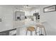 Modern kitchen with breakfast bar and stainless steel appliances at 540 N May St # 1102, Mesa, AZ 85201
