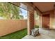 Covered patio with artificial turf and cooler at 540 N May St # 1102, Mesa, AZ 85201