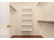 Roomy closet with built-in shelving and hanging rods at 5445 E Farmdale Ave, Mesa, AZ 85206