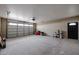 Garage with automatic door opener and extra storage space at 5647 E Calle Pitaya --, Guadalupe, AZ 85283