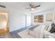 Virtually staged bedroom with large closet and window at 5671 N 79Th St # 2, Scottsdale, AZ 85250