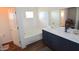 Bathroom features a large soaking tub and double vanity at 7229 S 48Th Ln, Laveen, AZ 85339