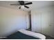 Bedroom with double bed and built-in closet at 7229 S 48Th Ln, Laveen, AZ 85339