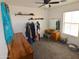 Bedroom with dresser, mirror and clothing rack at 7229 S 48Th Ln, Laveen, AZ 85339