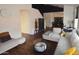 Open living area with sectional sofa and access to other rooms at 7229 S 48Th Ln, Laveen, AZ 85339