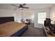 Spacious main bedroom with sitting area and large window at 7229 S 48Th Ln, Laveen, AZ 85339
