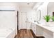 Elegant bathroom with marble shower, soaking tub, and modern vanity at 7272 E Gainey Ranch Rd # 75, Scottsdale, AZ 85258