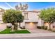 Attractive stucco home with two-car garage and lush landscaping at 7272 E Gainey Ranch Rd # 75, Scottsdale, AZ 85258