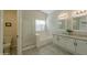 Elegant bathroom with double vanity, soaking tub, and shower at 1225 E Redfield Rd, Phoenix, AZ 85022