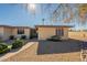 Front view of a single-story home with a walkway at 13622 N 98Th Ave # R, Sun City, AZ 85351