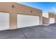 Attached garage with white door at 17610 N 17Th Pl # 6, Phoenix, AZ 85022