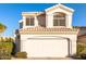 Two-story home with attached two-car garage and desert landscaping at 18637 N 35Th St, Phoenix, AZ 85050