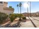 The side of the house features low-maintenance landscaping and a view of the community at 18637 N 35Th St, Phoenix, AZ 85050