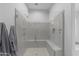 Spacious shower with glass enclosure and built-in seat at 22678 E Stacey Rd, Queen Creek, AZ 85142