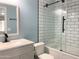 Updated bathroom with subway tile shower and modern vanity at 34611 N 30Th Ave, Phoenix, AZ 85086