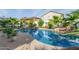 Inviting backyard pool with lush landscaping and patio area at 3466 E Turnberry Dr, Gilbert, AZ 85298