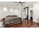 Main bedroom with hardwood floors and mirrored closet doors at 3470 E Wildhorse Dr, Gilbert, AZ 85297