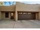 Attached garage with one car door and additional storage at 35621 N Mamie Maude Dr, Carefree, AZ 85377