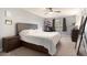 Spacious bedroom with wooden furniture and ceiling fan at 3911 E Nisbet Rd, Phoenix, AZ 85032