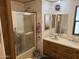 Bathroom with shower/tub combo and wood vanity at 4065 E University Dr # 568, Mesa, AZ 85205