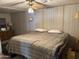 Spacious main bedroom with large bed and dresser at 4065 E University Dr # 568, Mesa, AZ 85205