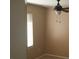 Small bedroom with ceiling fan and window at 45638 W Dirk St, Maricopa, AZ 85139